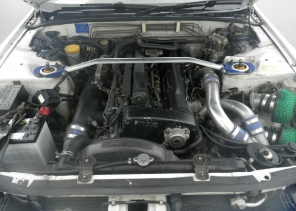 The twin-turbo 2.6-liter engine of a 1993 Nissan Skyline GT-R (R32) exported by Japan Car Direct