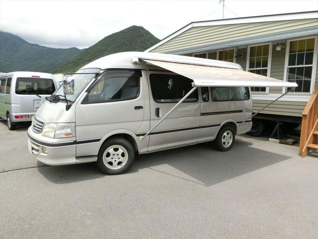 S and E Toyota Hiace with Gas Engine In Text Photo 2. Used Hiace camper van with bunks and awning. Import from Japan