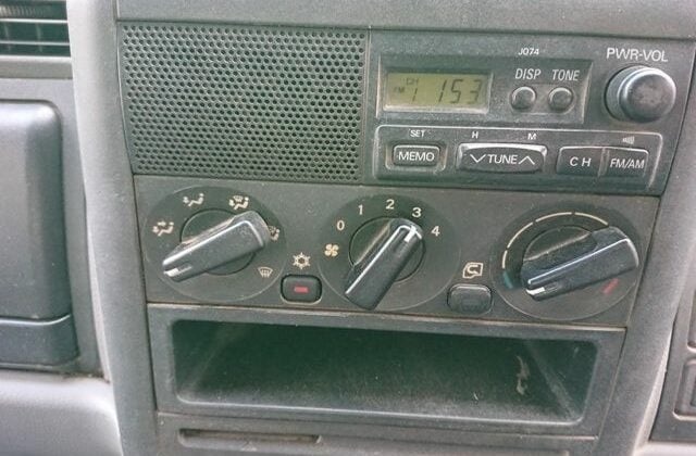 24-2006-Mitsubishi-Canter-Dump-Truck.-Radio-and-heating-and-air-conditioning-controls.-Simple-and-clean