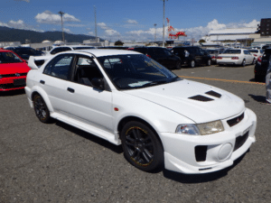 Mitsubishi Lancer, compact sedan, sporty car, reliable daily driver, performance upgrades, rally heritage, used cars from Japan, Japanese car auction, JDM import, Japan Car Direct