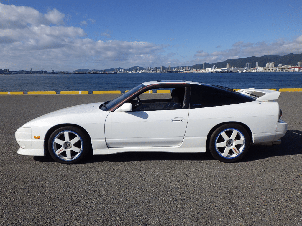 Nissan 180SX, JDM Classic, Turbocharged Performance, Rear-Wheel Drive, Pop-Up Headlights, Drift Icon, Japan Car Auctions, Lightweight Sports Car, Japanese Performance Car, Japan Car Direct, RPS13