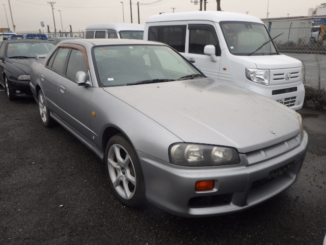 Nissan Skyline ER34, JDM Icon, Turbocharged Performance, Rear-Wheel Drive, Japanese Sports Sedan, Japan Car Auctions, RWD Performance, Skyline Legacy, Japan Car Direct